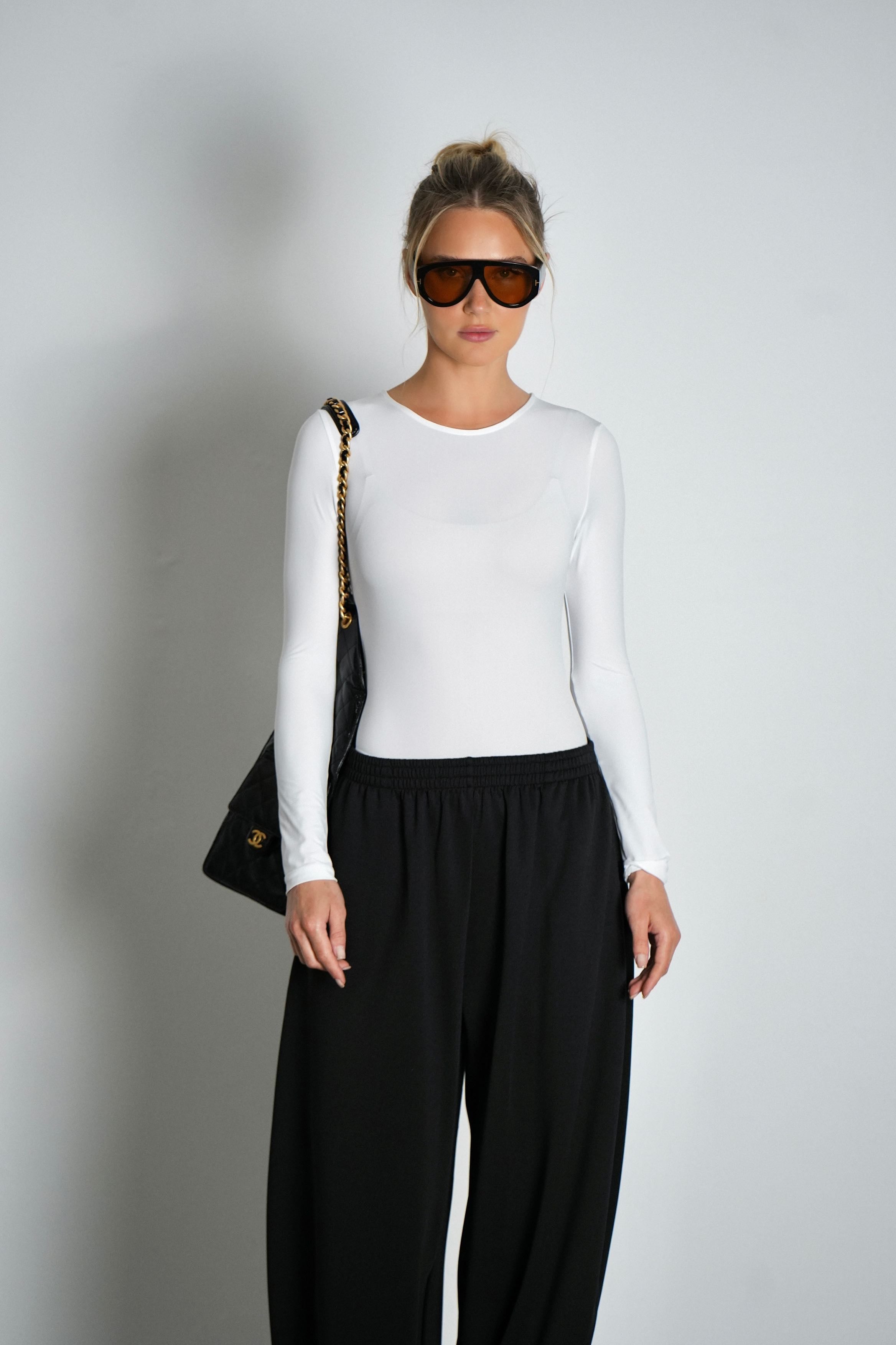 בגד גוף מילגה-לבן